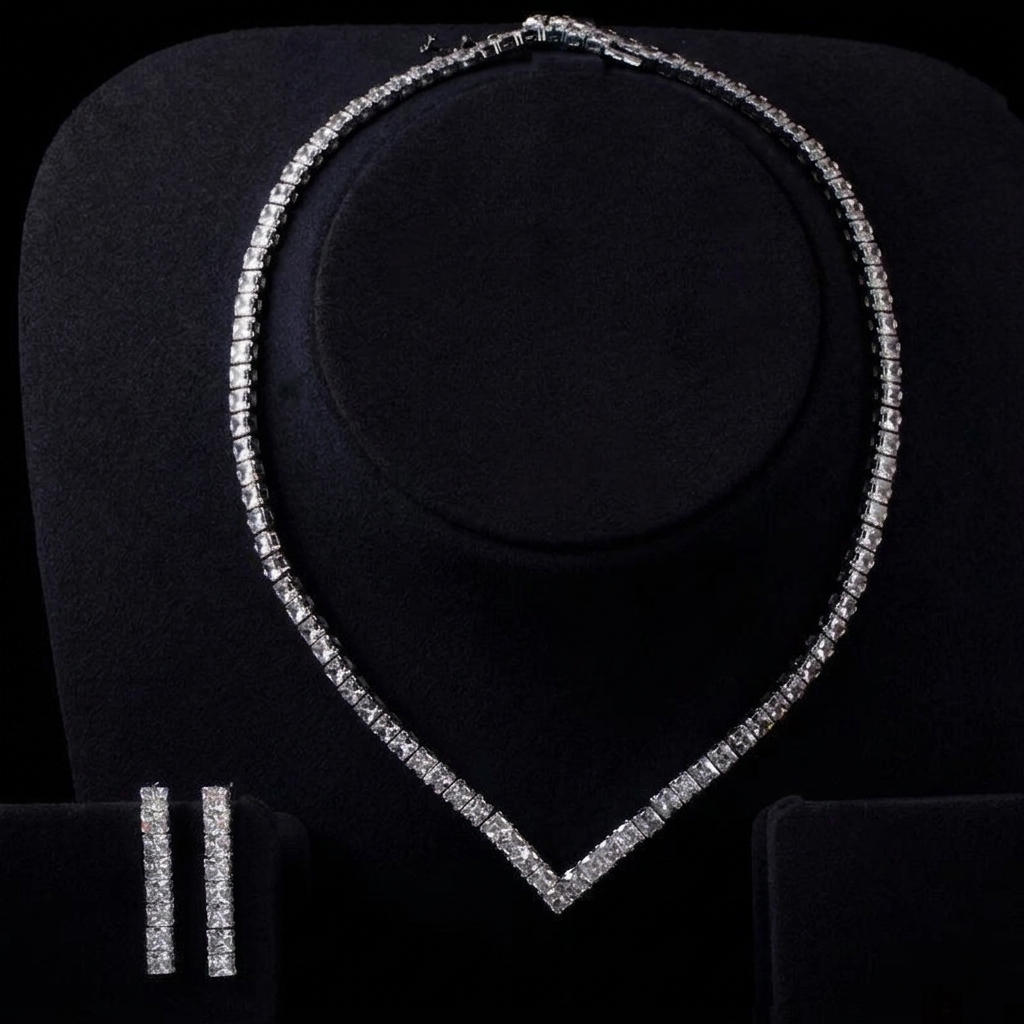 Sparkling V-shaped cubic zirconia tennis necklace and matching linear drop earrings set