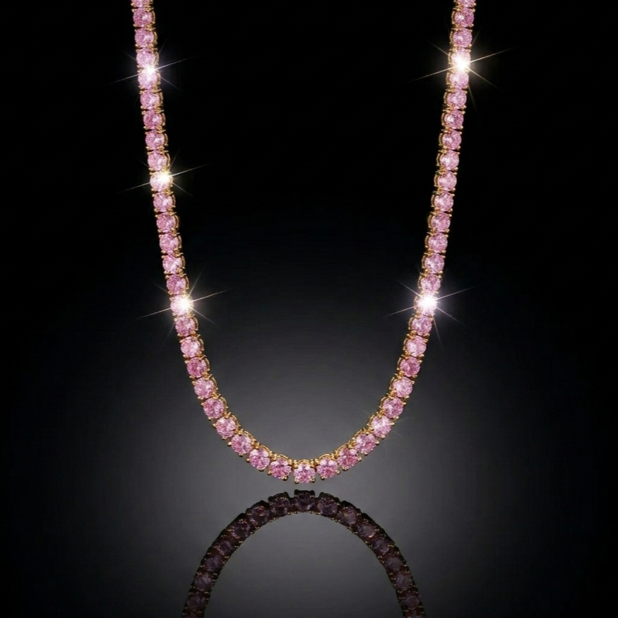 Luxury pink gemstone tennis necklace hanging in a symmetrical U-shape against a pitch-black background with dramatic lighting and a soft surface reflection.